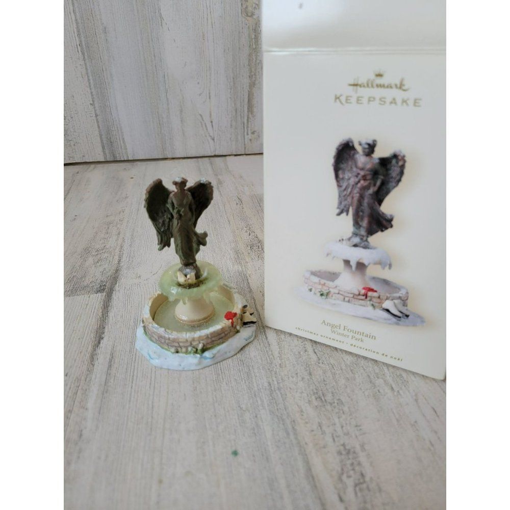 Hallmark Angel fountain Winter Park cherub ornament 2007 Xmas tree‎